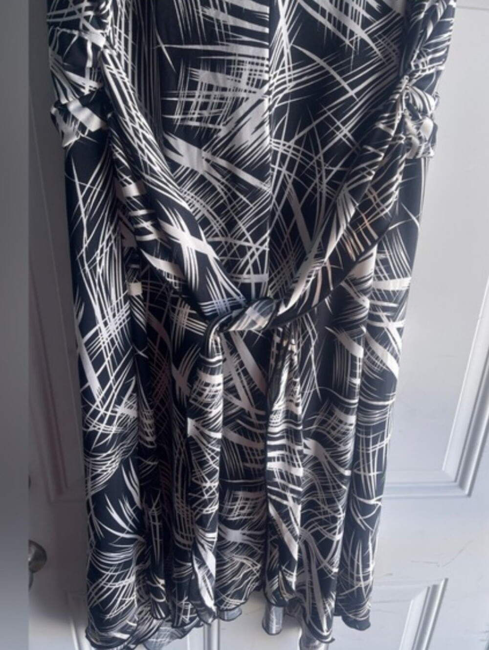 Sleeveless Black and White V-Neck Handkerchief Hem Dress - Picture 9 of 9